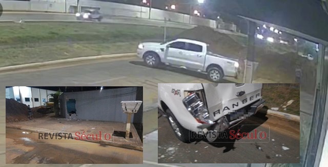 Ao realizar manobra, mulher colide camionete contra parede de residência
